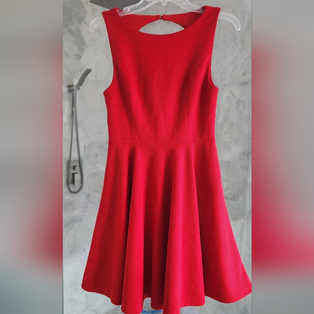 Preowned Lulus Open Back Mini dress.  Size M